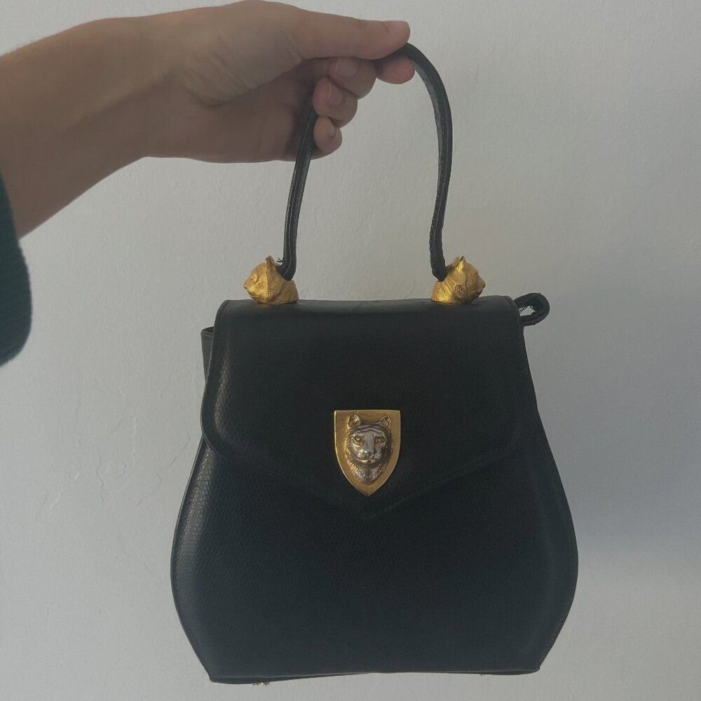 Vintage Black Leather Shoulder Bag with Gold Cat Accent Detail